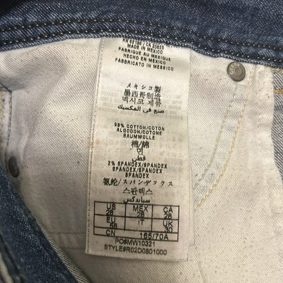 Guess mini Jean skirt with floral embellishments. Ladies size US28 - Picture 9 of 9